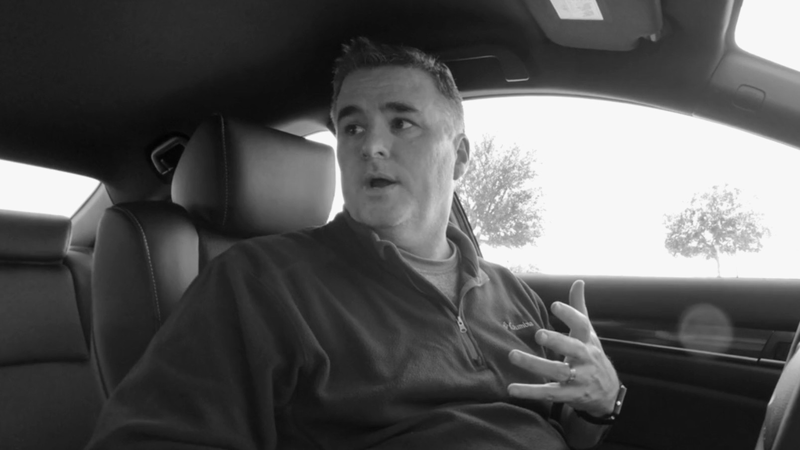 Customer speaking from inside a vehicle