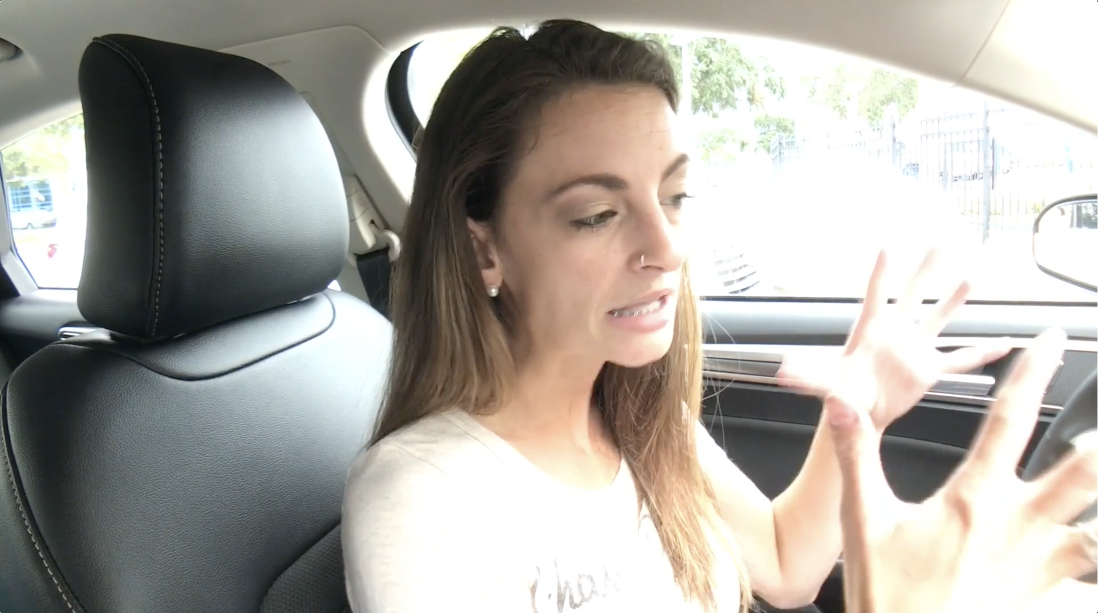 Customer speaking from inside a vehicle